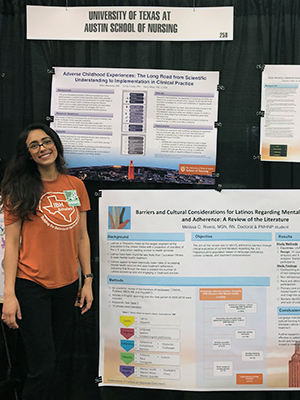 Nursing student displaying research posters at SXSW 2018 Festival