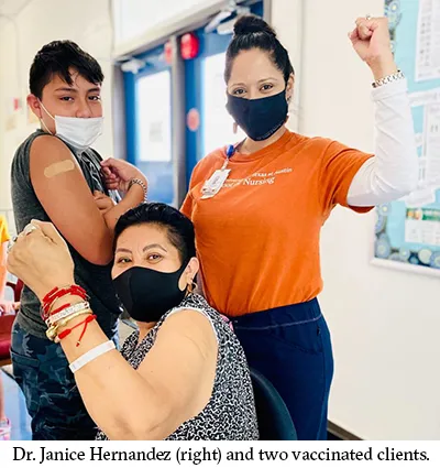Dr. Janice Hernandez (right) and two vaccinated clients.