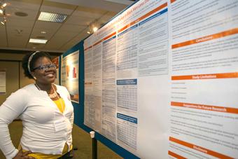 Nursing student presenting at the St. David's CHPR Poster Presentation