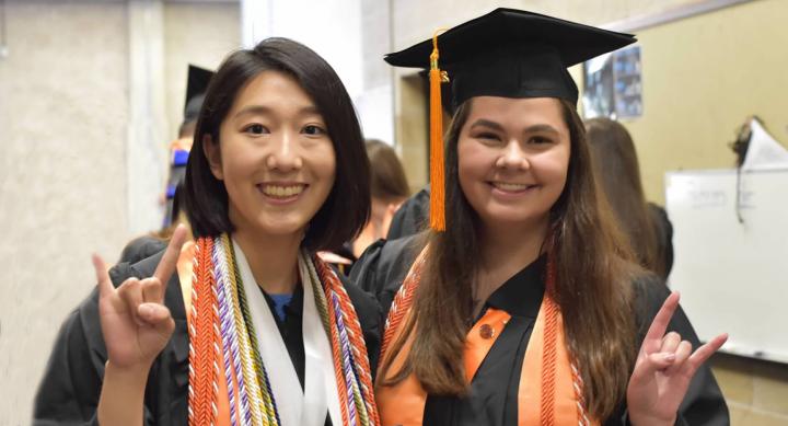 Nursing students with cap and gown