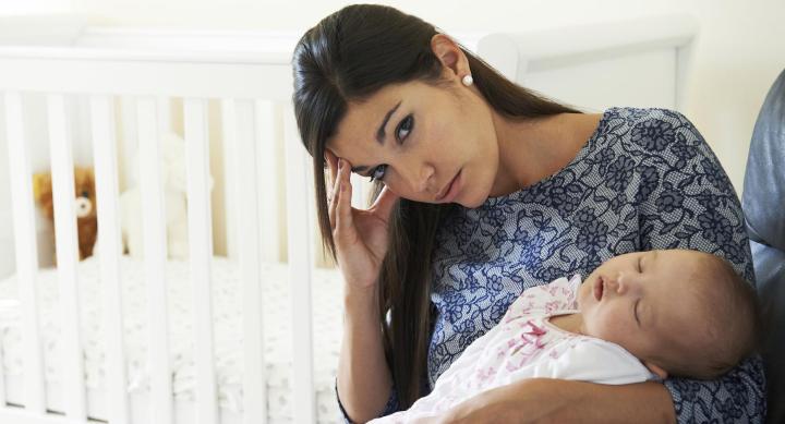  Mother holding a child