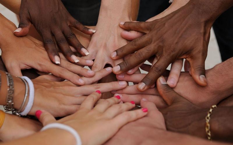 Hands working together