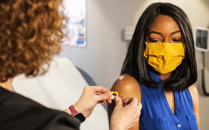 African American woman getting a medical treatment
