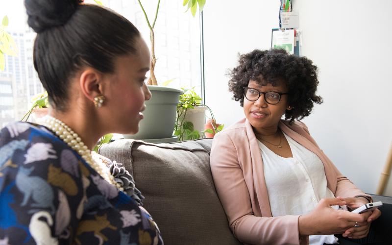 African American Women talking with each other