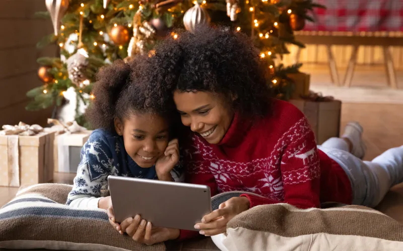 Woman and Child View iPad Christmas